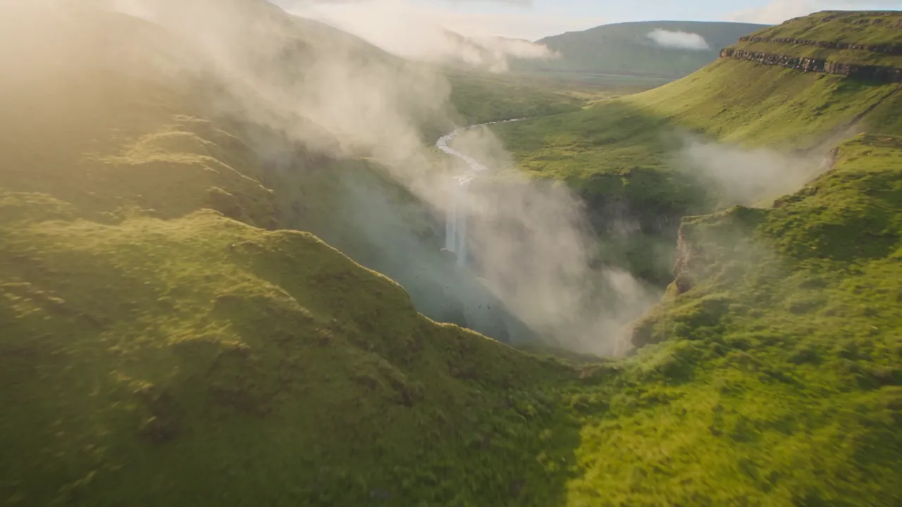 Frame from a waterfall-valley clip generated by Creamify's Dream video engine